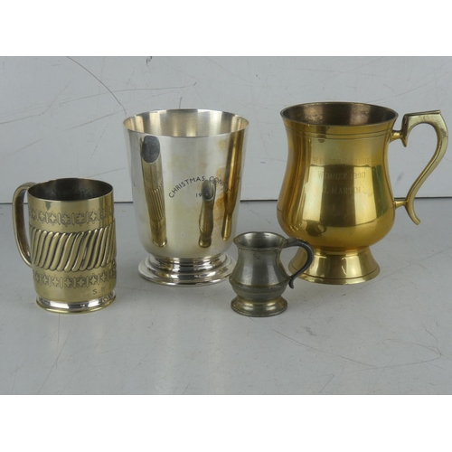 257 - A collection of pewter and silver plated tankards.