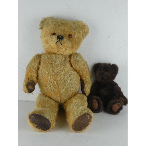 262 - An antique teddy bear and another.