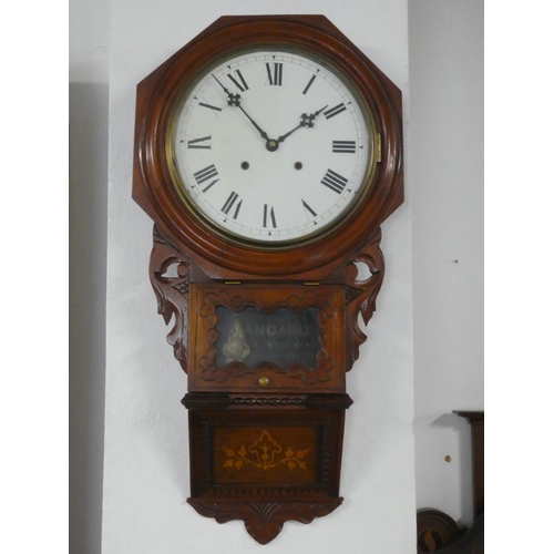 339 - A stunning antique American drop dial clock with original label.