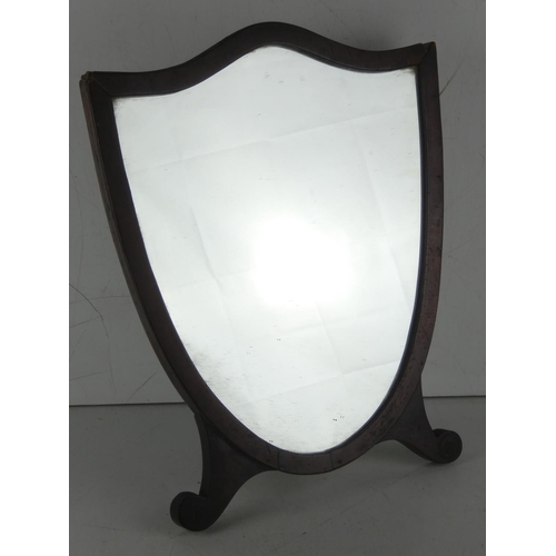 340 - An antique shield dressing table mirror.