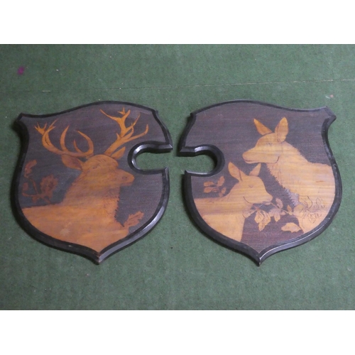 342 - A pair of decorative vintage pokerwork shields.