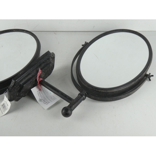 352 - A pair of ex shop stock wall mounted mirrors.