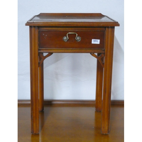 359 - A vintage wooden side table with drawer.