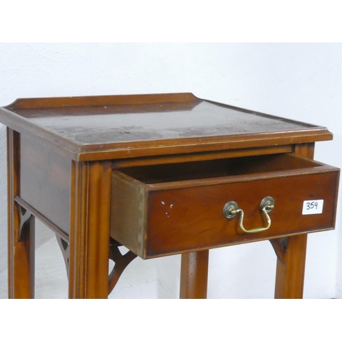 359 - A vintage wooden side table with drawer.