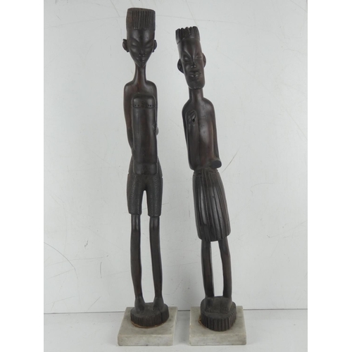 373 - A pair of large carved wooden African figures.