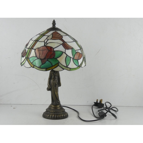 379 - A decorative table lamp with stained glass shade.