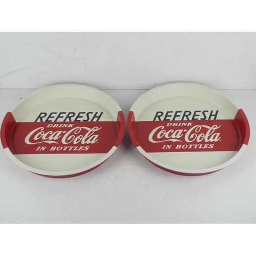 382 - A pair of Coca Cola trays.