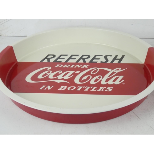 382 - A pair of Coca Cola trays.