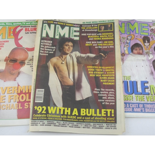 383 - A small collection of NME Magazines.