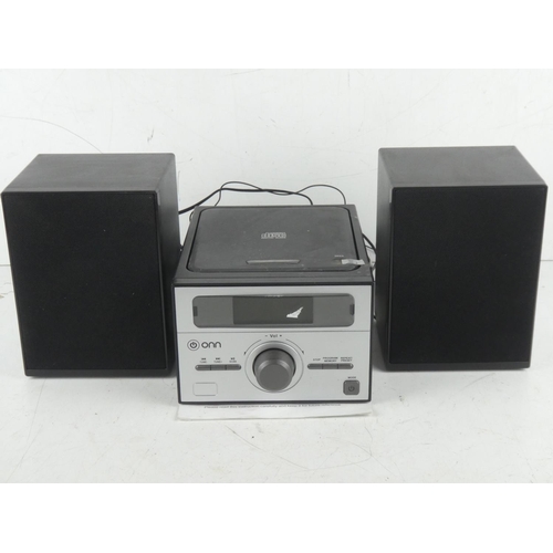 384 - A CD player with speakers.