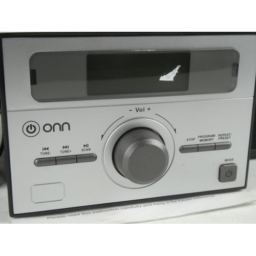 384 - A CD player with speakers.