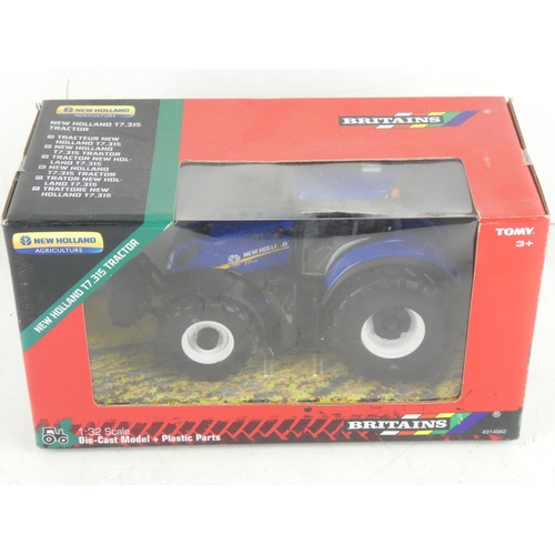 396 - A boxed Britains New Holland T7 315 model tractor.