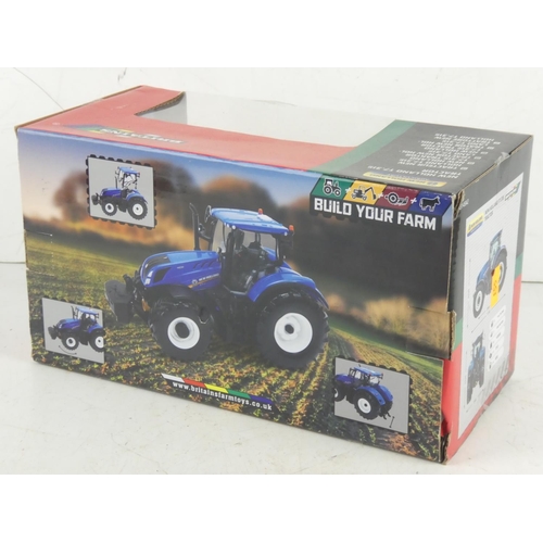 396 - A boxed Britains New Holland T7 315 model tractor.