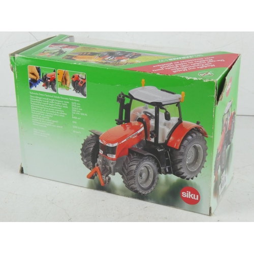 397 - A boxed Siku 3270 Massey Ferguson MF 8680 model Tractor.