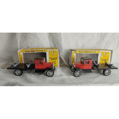 403 - A pair of vintage tin plate 'Blechmodelle' model trucks in original boxes.