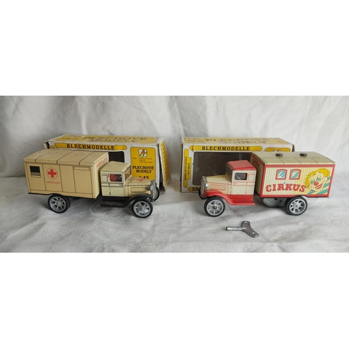 404 - A pair of vintage tin plate 'Blechmodelle' model trucks in original boxes.