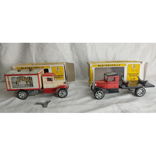 405 - A pair of vintage tin plate 'Blechmodelle' model trucks in original boxes.