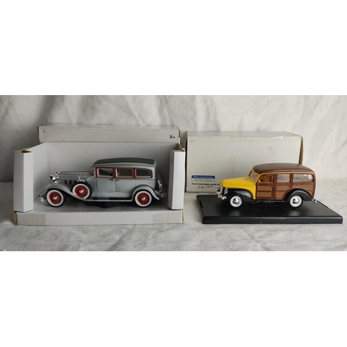 406 - 2 diecast model cars, to include a 1940 Ford Woody & more.