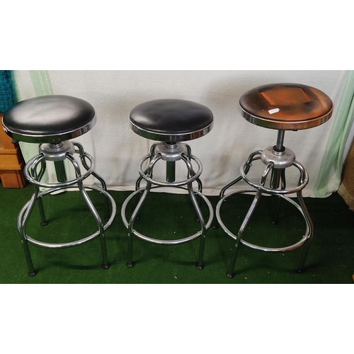 417 - 3 swivel top bar stools.