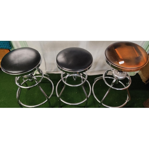 417 - 3 swivel top bar stools.