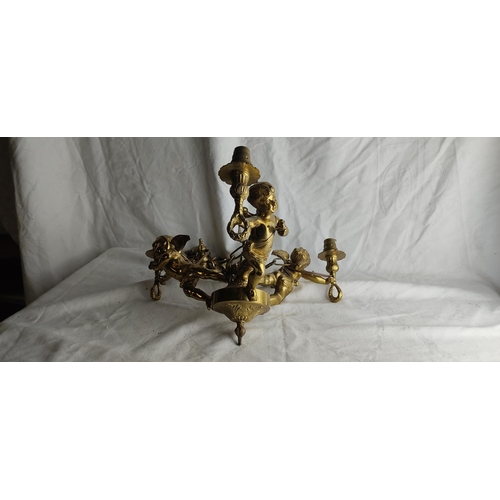 421 - A stunning antique style heavy brass cherub pendant light.