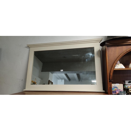 422 - A modern over mantle mirror.