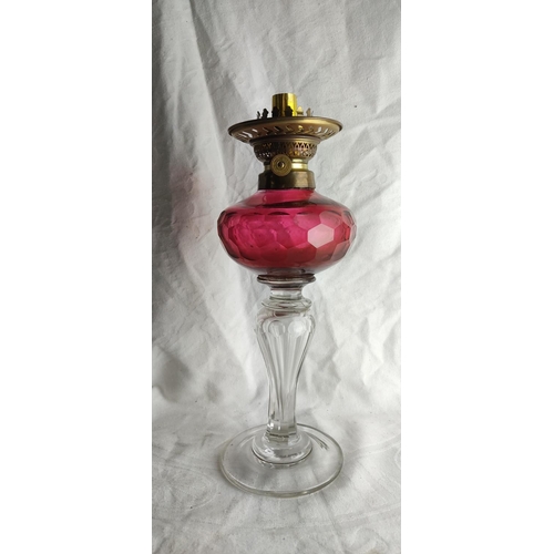 424 - An antique Ruby Glass oil lamp base.