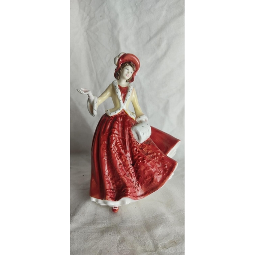 430 - A Royal Doulton figure, 'Christmas Day 1999'.