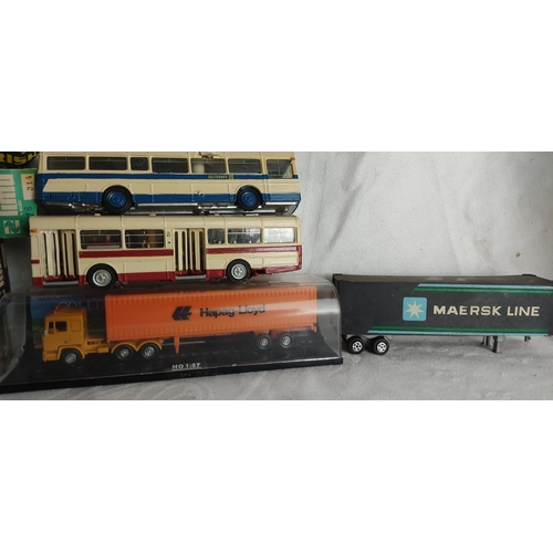 435 - A collection of model vehicles to include trains, buses & more.