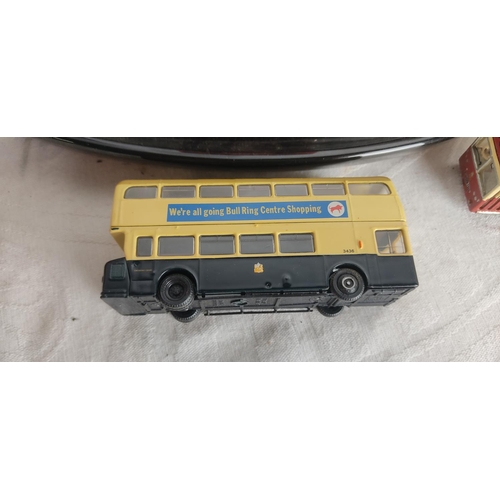 440 - A collection of model buses.