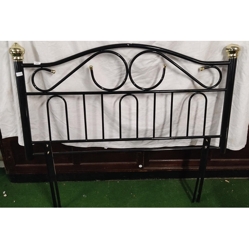 451 - A metal double bed headboard.