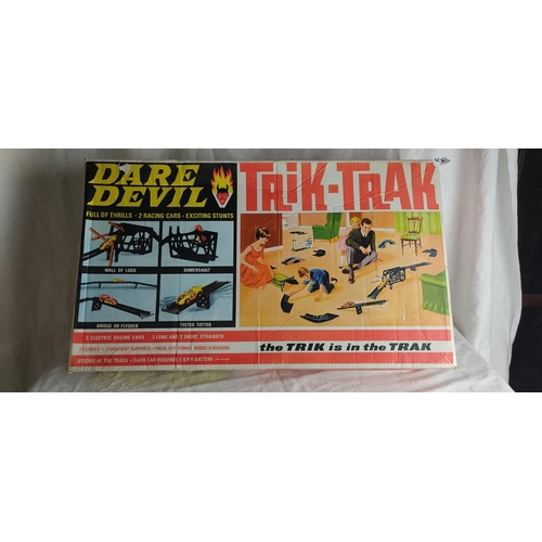 457 - A vintage 'Dare Devil - Trik Trak' racing game in original box.