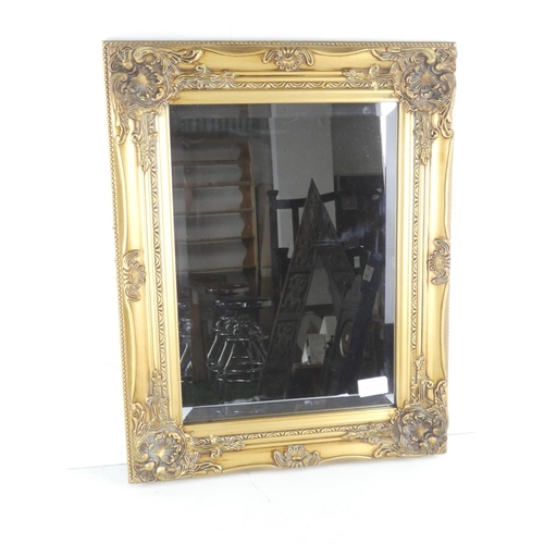 478 - A stunning gilt framed wall mirror by Select Mirrors.