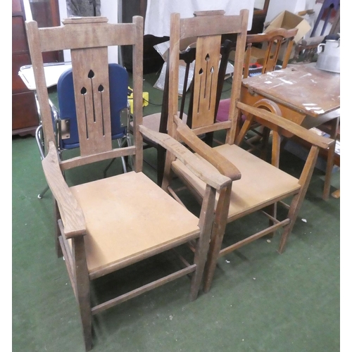 487 - A stunning pair of Arts & Crafts style armchairs.