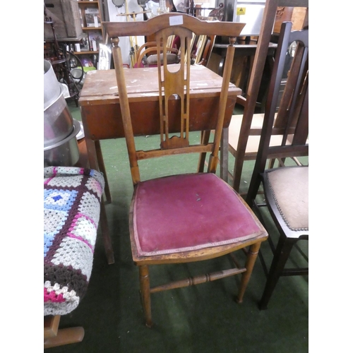 490 - An Arts and Crafts style bedroom chair.