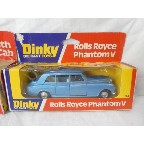 110 - Two vintage boxed Dinky die cast toys - Plymouth Yellow Cab and Rolls Royce Phantom V.