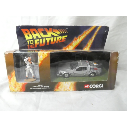 124 - A boxed Corgi 'Back to the Future' CC05501 DeLorean Time Machine and Doc Emmets Brown resin figure.