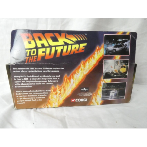 124 - A boxed Corgi 'Back to the Future' CC05501 DeLorean Time Machine and Doc Emmets Brown resin figure.