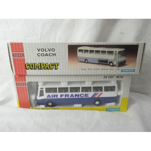 127 - Two boxed Joal Compact Volvo Coaches - Air France & JE Tways Travellers.