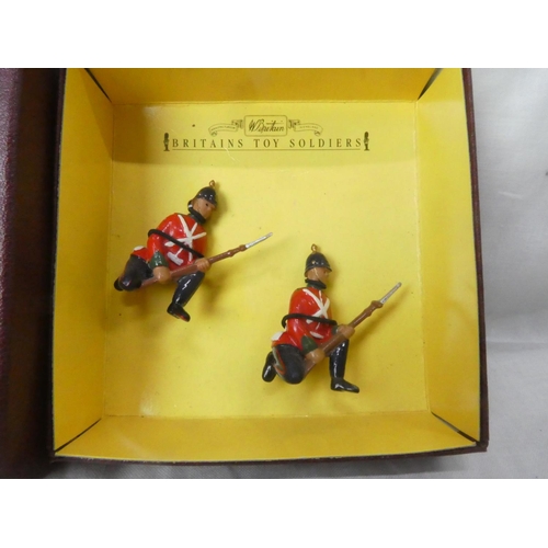 130 - A boxed Britains 8817 'Sherwood Foresters' hand painted - two kneeling on guard figures.