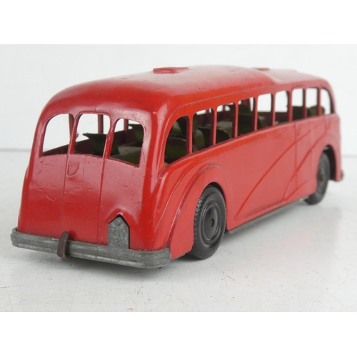 25 - A vintage diecast Mettoy 820 red clockwork bus.