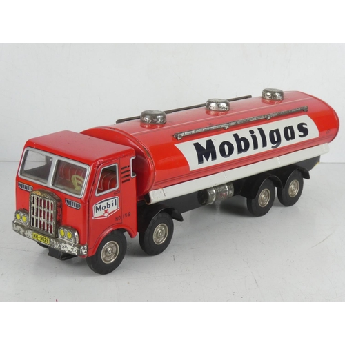 38 - A large vintage Horikawa of Japan tin plate friction driven 'Mobil - Mobilgas' tanker.