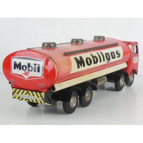 38 - A large vintage Horikawa of Japan tin plate friction driven 'Mobil - Mobilgas' tanker.