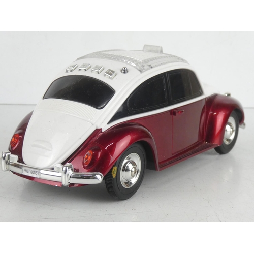 40 - A novelty speaker, modelled as a VW beetle.