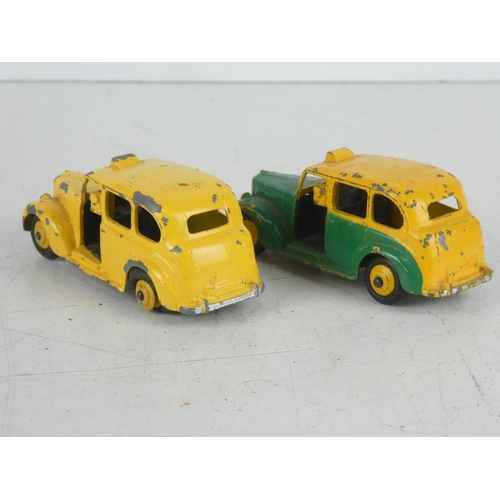 42 - 2 vintage Dinky/ Meccano Ltd Austin Taxi cars.