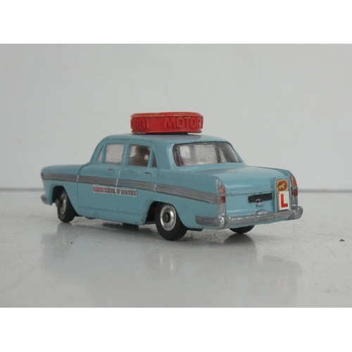 52 - A vintage Corgi Toys Austin A60 'Motor School' diecast car.