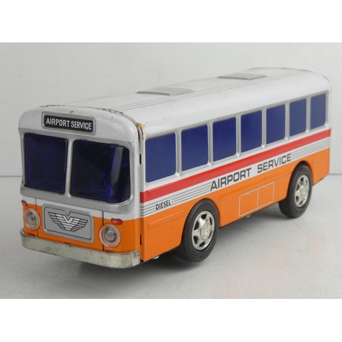 55 - A vintage Japanese battery powered tin plate 'Airport Service' bus.