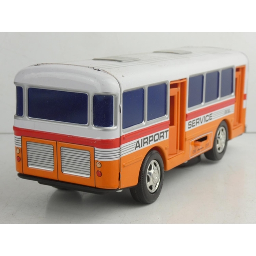 55 - A vintage Japanese battery powered tin plate 'Airport Service' bus.