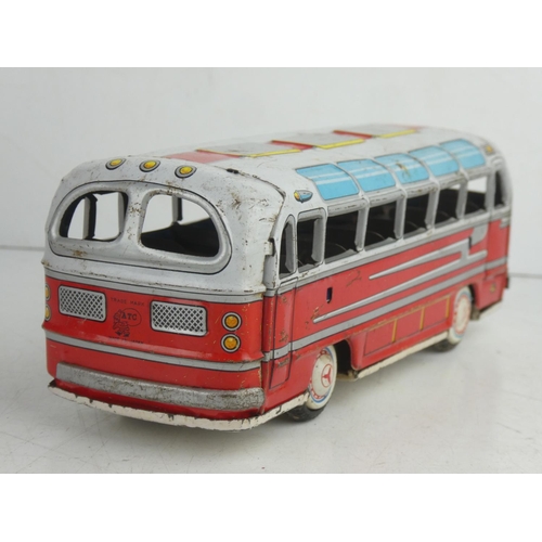 56 - A vintage Japanese friction driven tin plate bus.