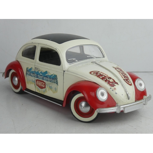 57 - A large diecast Solido VW Beetle, advertising Coca Cola.